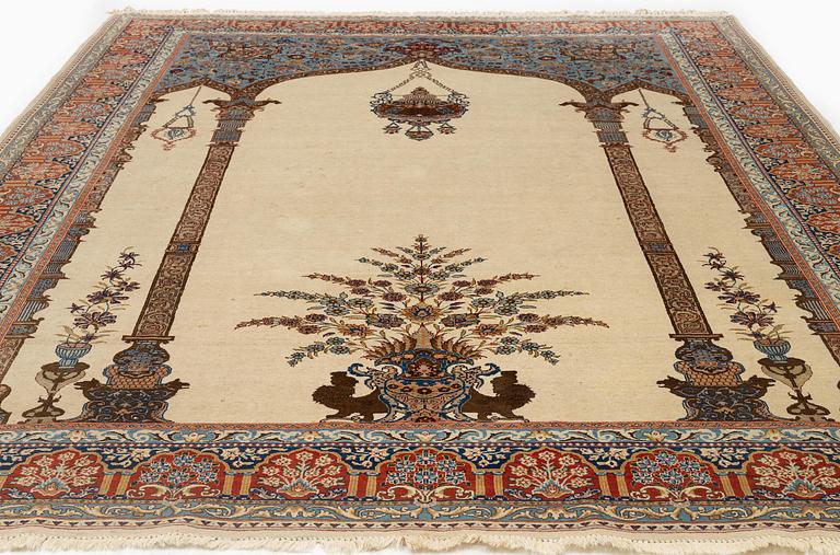 A Tabriz carpet, part silk, Northwest Persia (Iran), c. 323 x 246 cm.