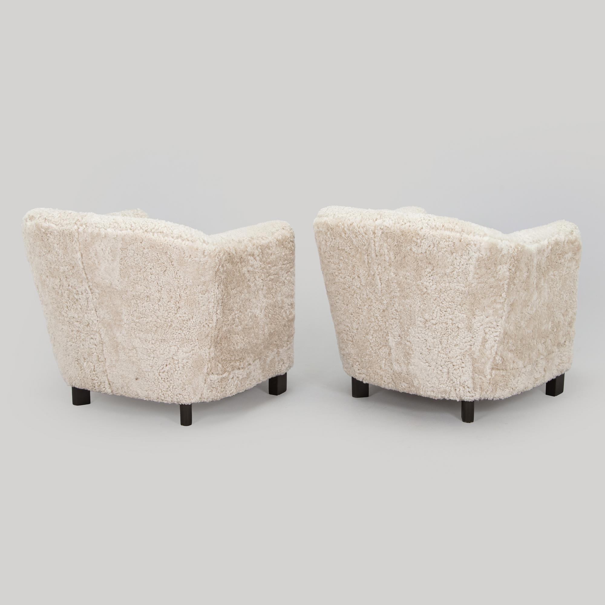 A pair of  1930s/40s. 'Continent' armchairs model 217, Asko, Finland.