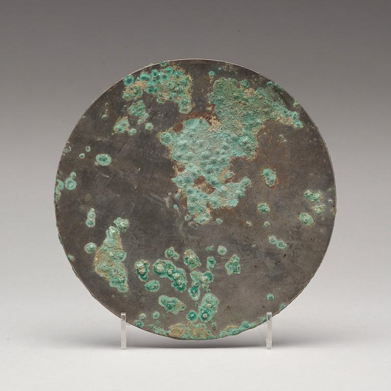 SPEGEL, brons. Handynastin (206 f.Kr.-220 e. Kr.).