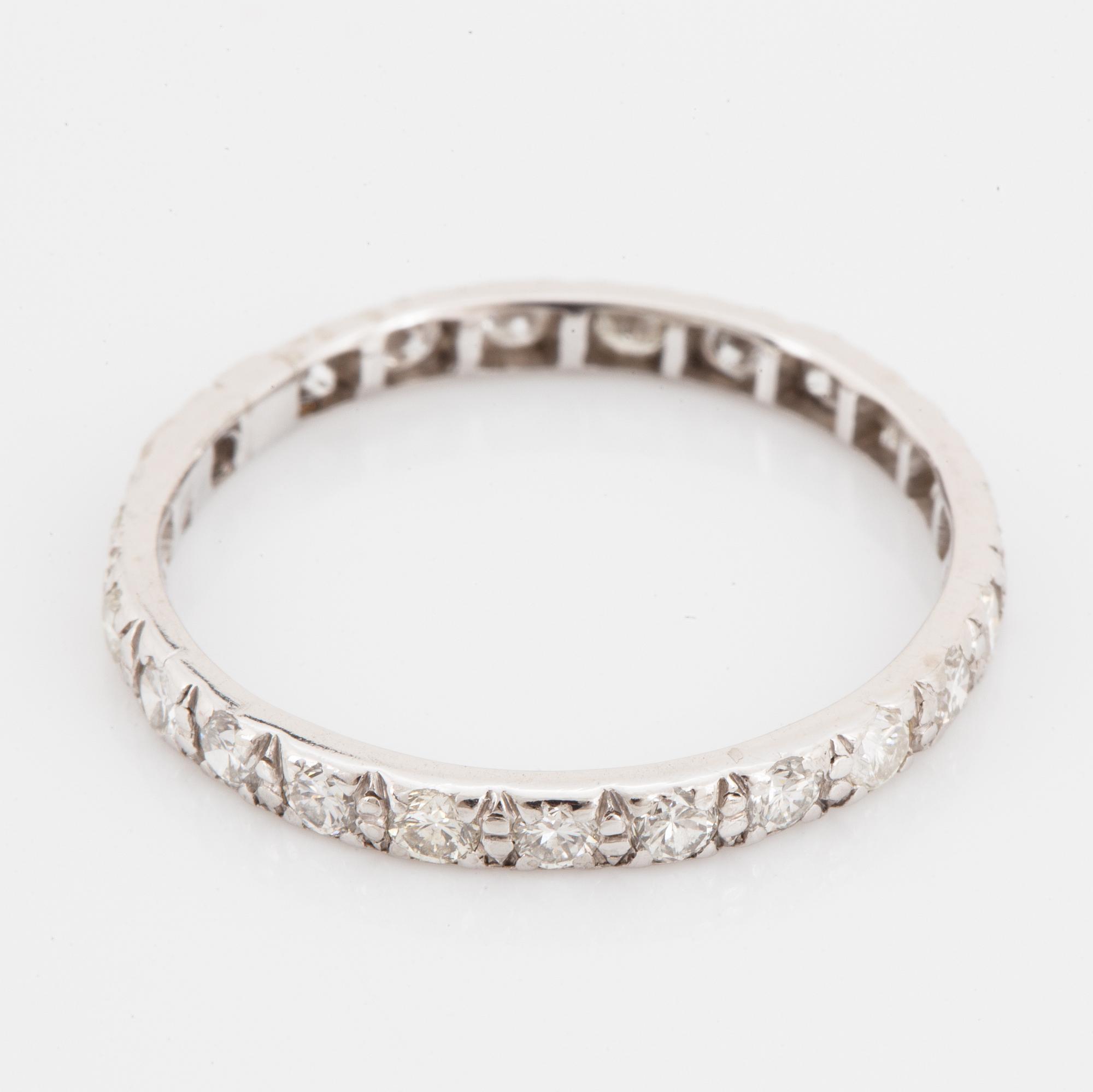 White gold brilliant-cut diamond eternity ring.