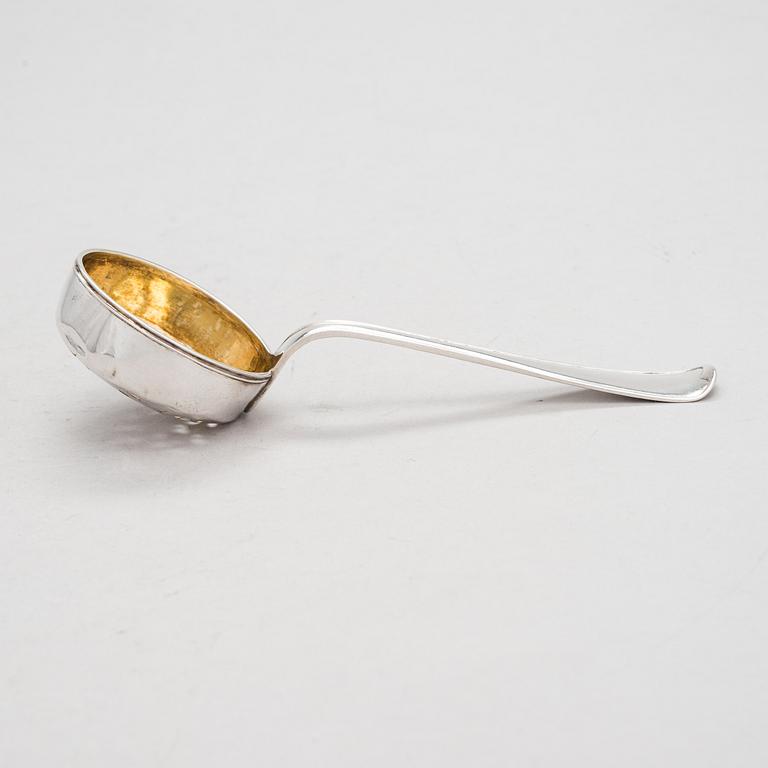 A late 18th-century parcel-gilt silver sprinkle spoon, maker's mark of Anders Törnqvist the elder, 1782.