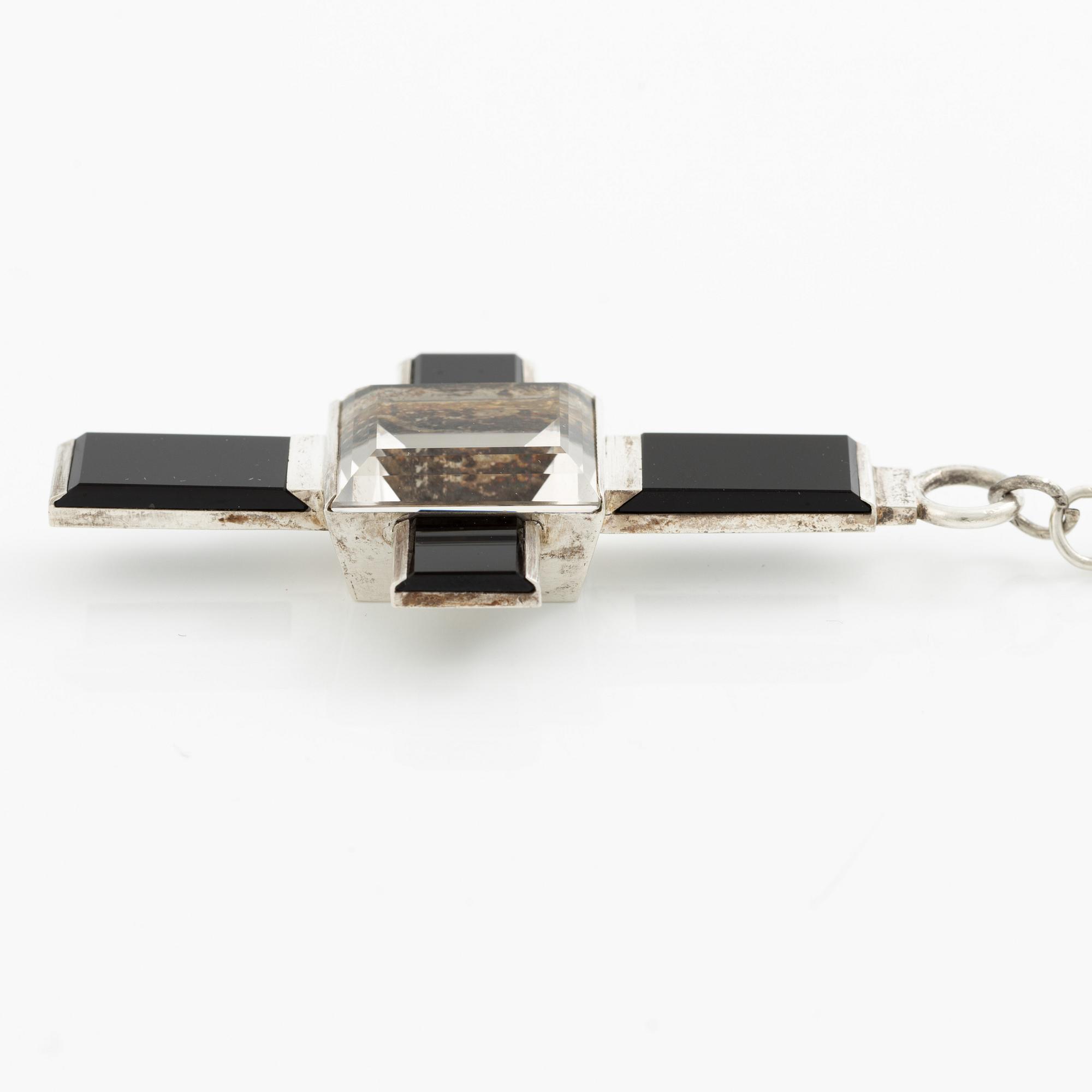 Wiwen Nilsson, a pendant in the form of a cross, sterling silver with onyx and step-cut rock crystal, Lund 1937.