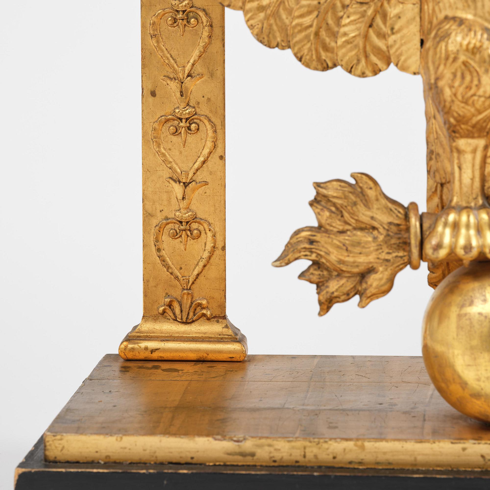 A Swedish Empire giltwood console table, early 19th century.