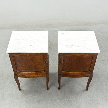 A pair of bedside tables, early 20th century.