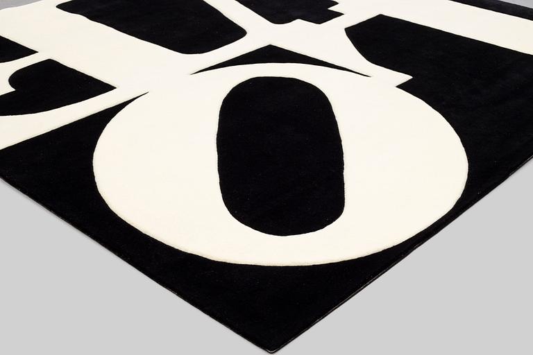 Robert Indiana, a carpet, 'White on Black', Chosen Love, hand tufted in 1995, ca 243 x 247,5 cm.