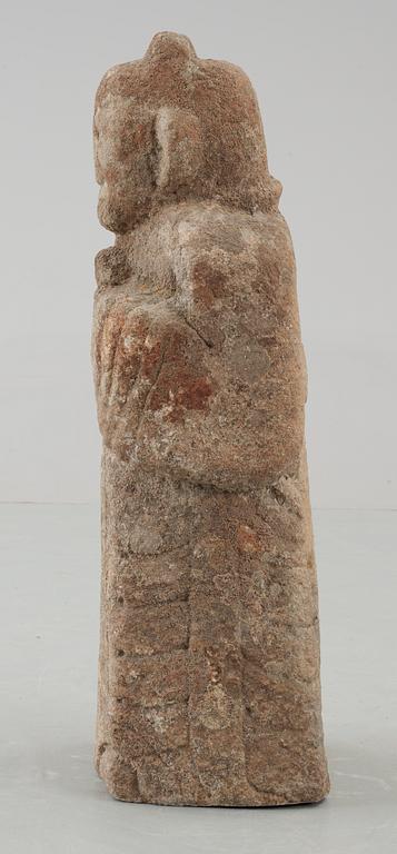 A stone sculpture of a guardian, presumably Han dynasty.