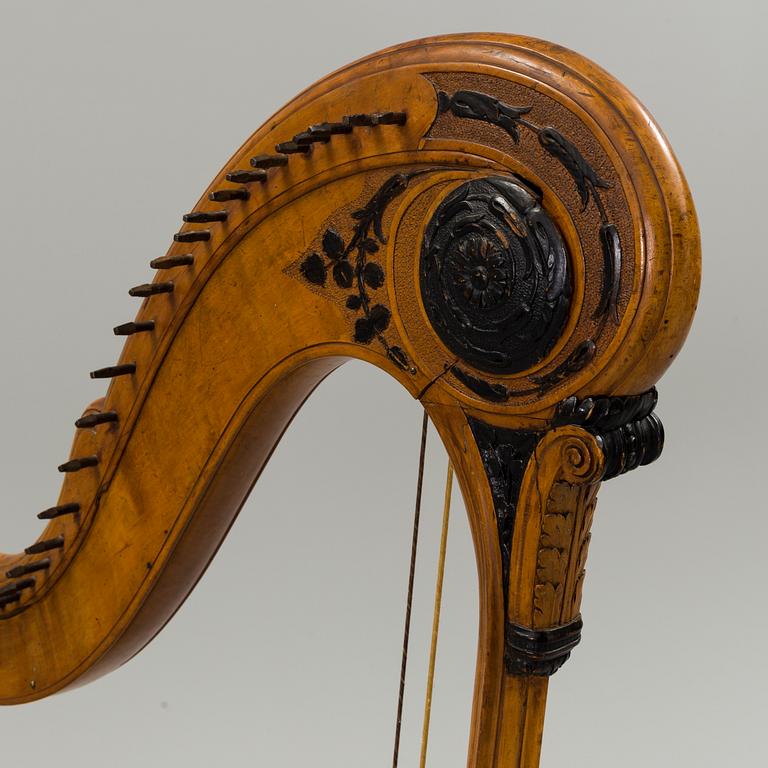 A birch and pine harp from Northern Europe, first half of the 19th century.