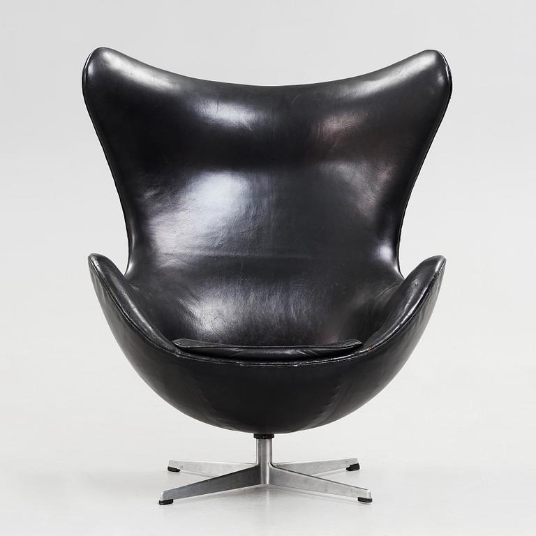 An Arne Jacobsen black leather 'Egg' chair, Fritz Hansen, Denmark 1960's.