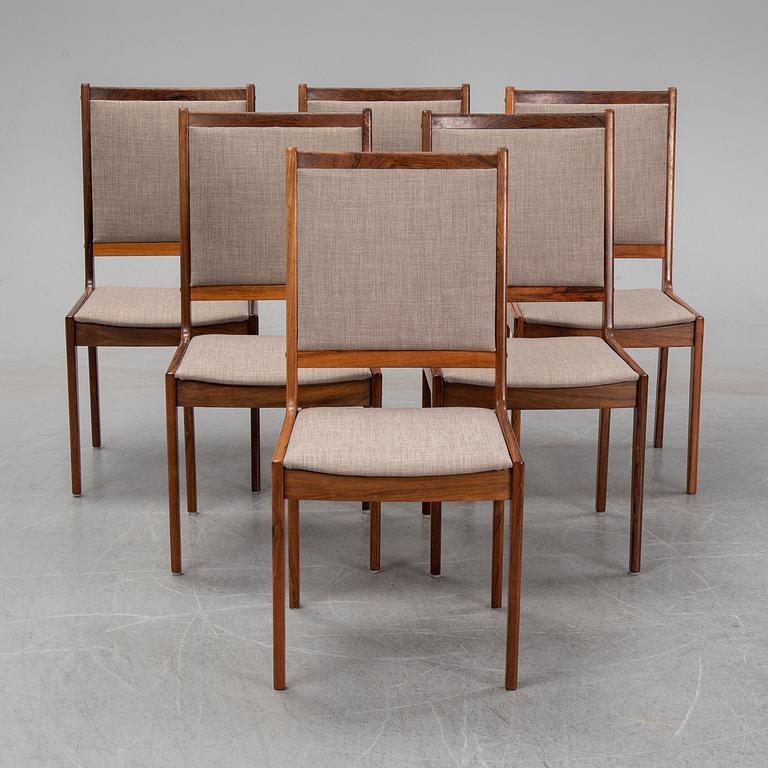 A seven-piece rosewood dining suite, 1960's/70's.