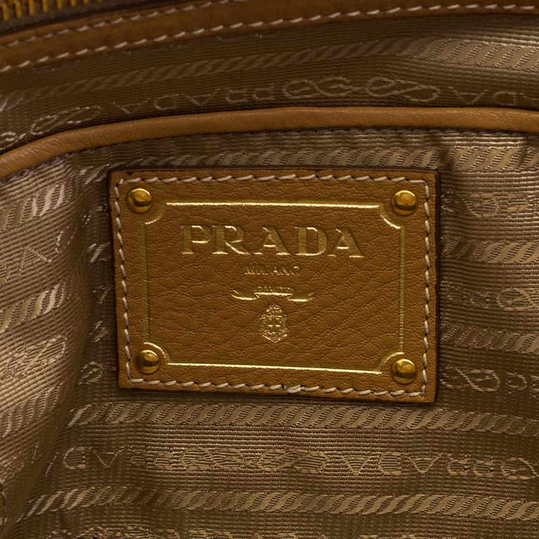 A Prada bag in vitello daino leather.