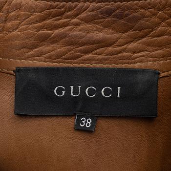 Gucci, a GG supreme jacket and shorts, size 38, 2000.