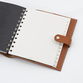 Hermès, a whisky leather notebook/agenda.