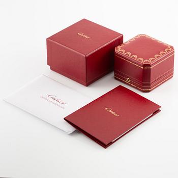 A Cartier ring in platinum with a round brilliant-cut diamond 0.91 ct according to the engraving.