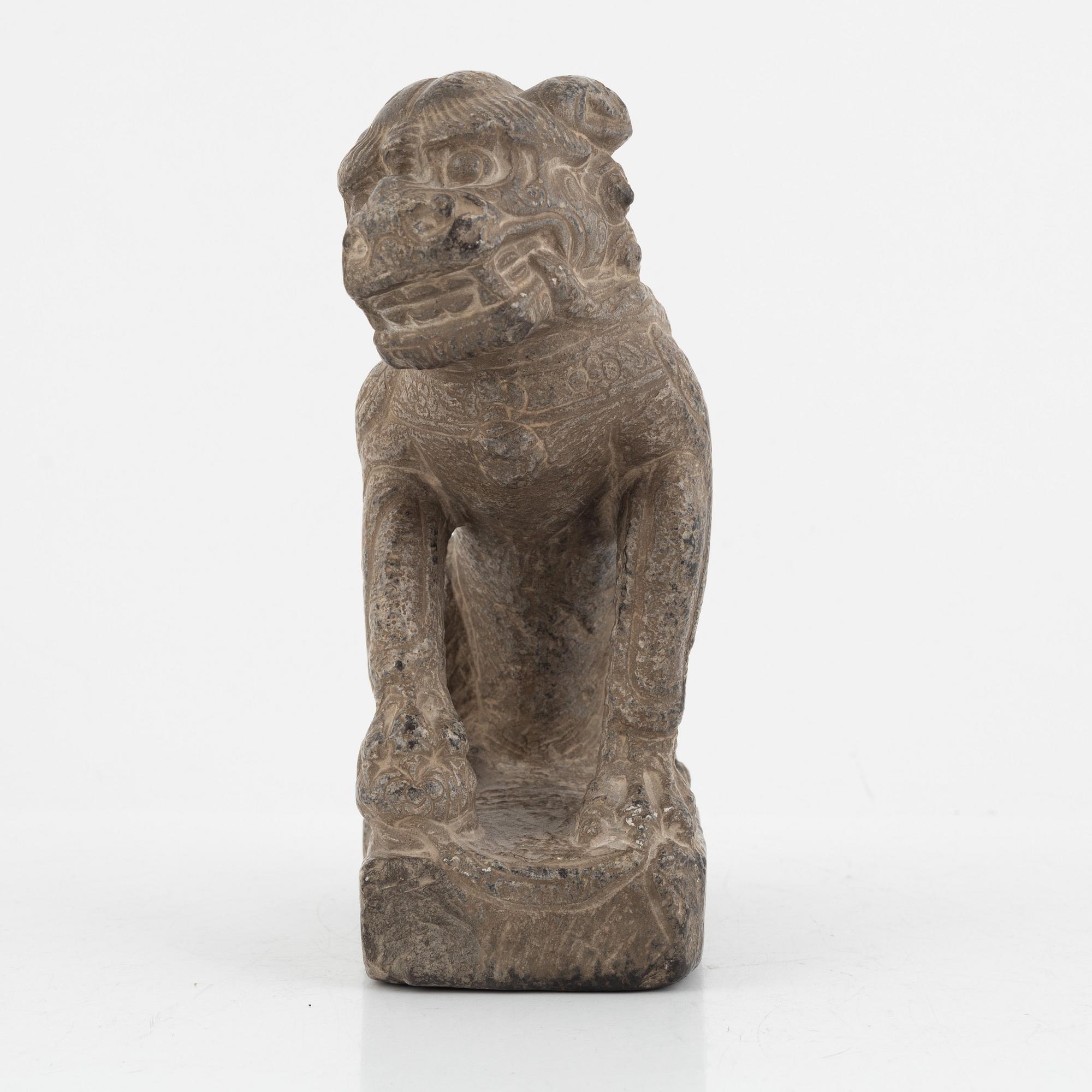A Chinese stone Buddhist lion, Ming dynasty (1368-1644).