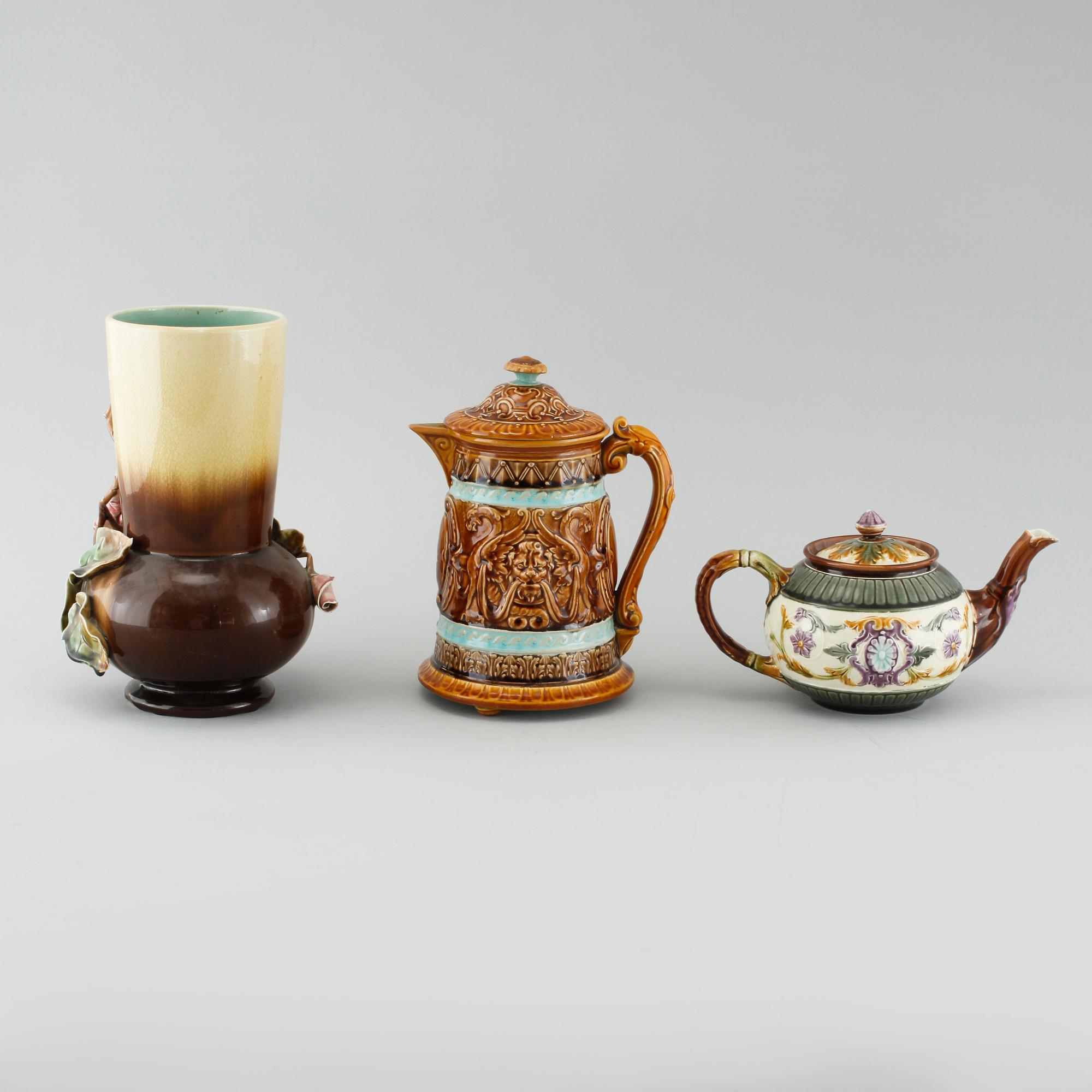 A majolica teapot, jug and vase from Rörstrand and Gustavsberg, around turn of the century 1900.