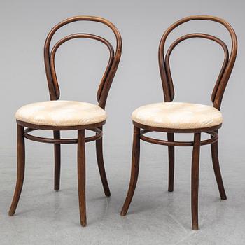 A pair of german chairs, early 20th century. Signed with labels.