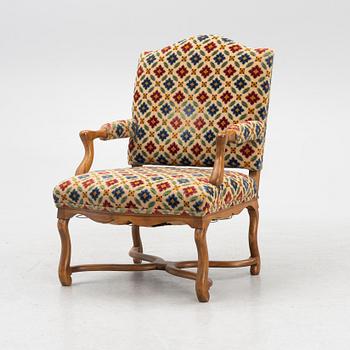 A Rococo style armchair, second half of the 20th Century.