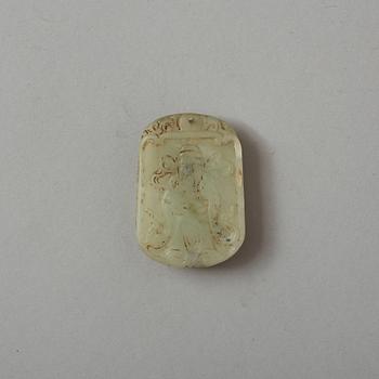 A carved nephrite pendant with the image of Sholaou, early 20th Century.