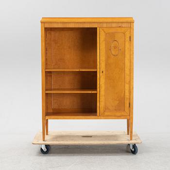A birch bookcase with cabinet, AB C E Jonsson, Stockholm, 1910's/20's.