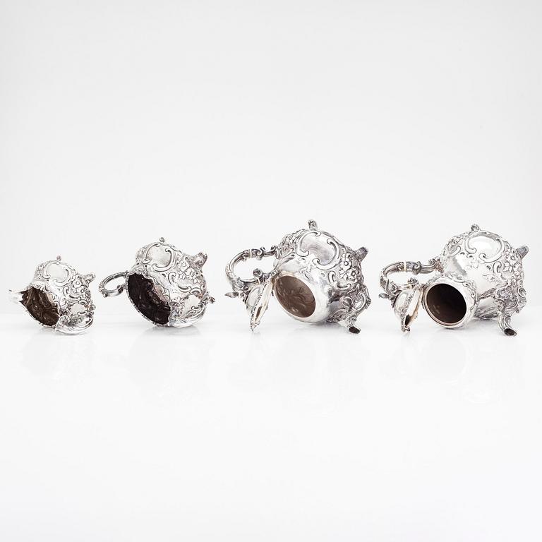 A Victorian four-piece sterling silver coffee and tea service, maker's mark of William Smily, London 1856.