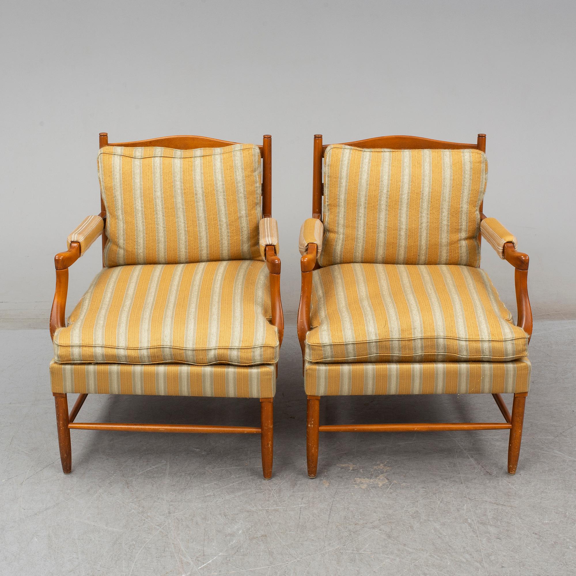 a pair of armchairs from the second half of the 20th century.