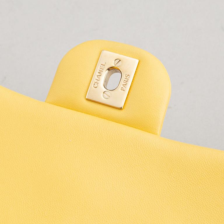 Chanel, a yellow, quilted leather 'Classic Mini Single Flap Bag', 2016-17.