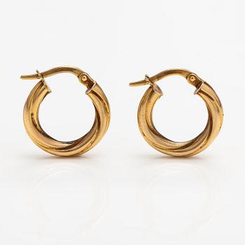 A pair of 14K gold earrings. Italy.