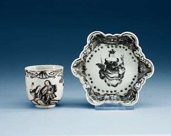 1508. A Grisaille 'European subject' cup and dish, Qing dynasty, Qianlong (1736-95).