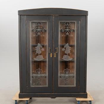 Display cabinet circa 1900.