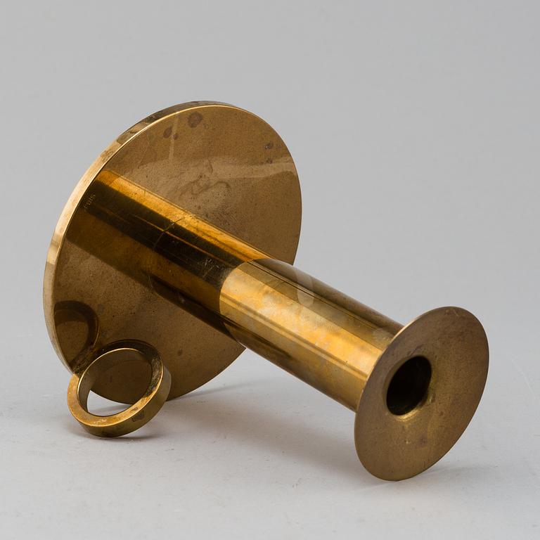 SIGURD PERSSON, a brass candlestick.