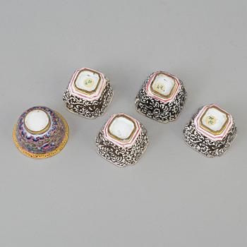 A chinese cloisonné tray, 20th century, and five enamel on copper cups, late 19th/early 20th century.