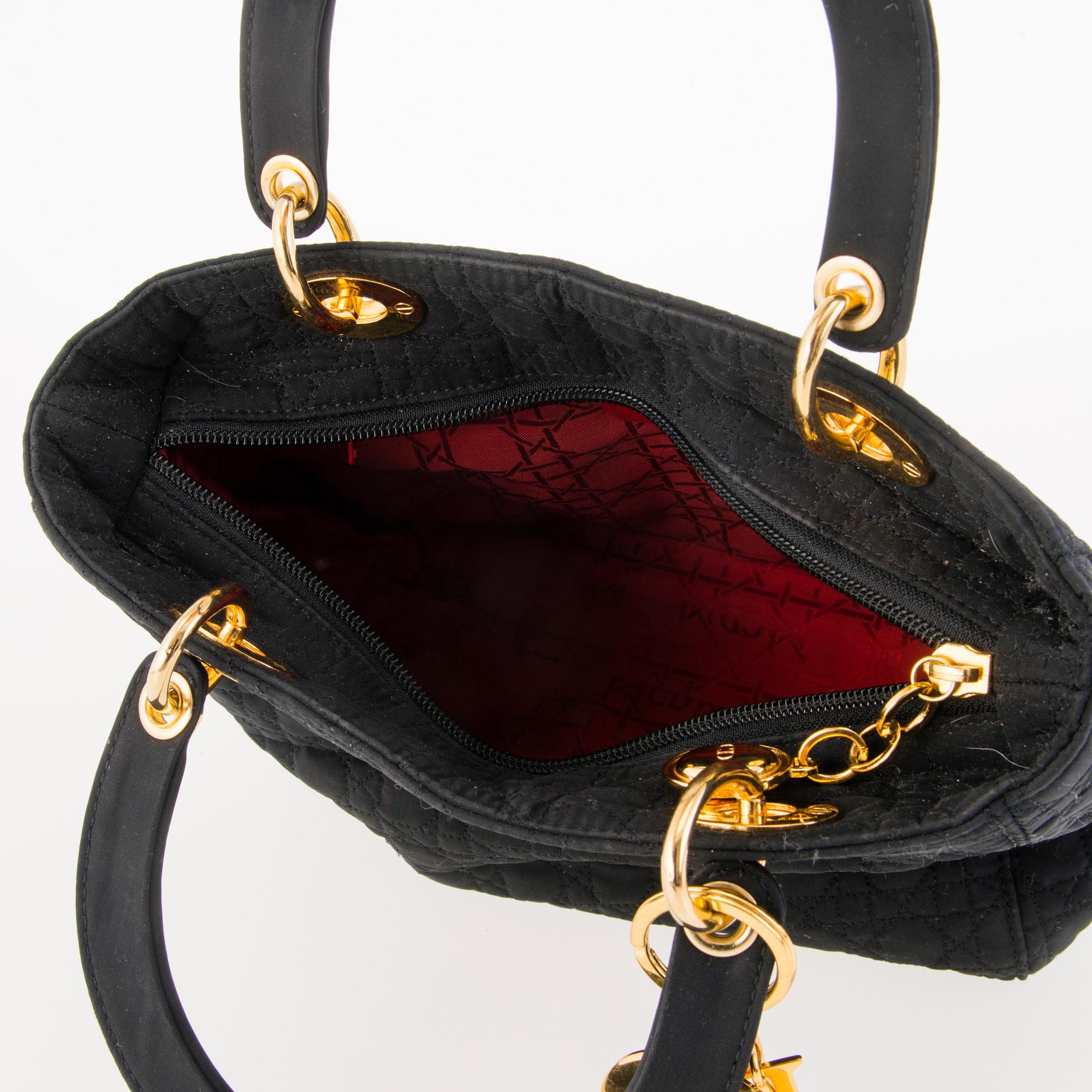 CHRISTIAN DIOR Lady Dior Handbag and Two Pairs of Tribal Earrings.