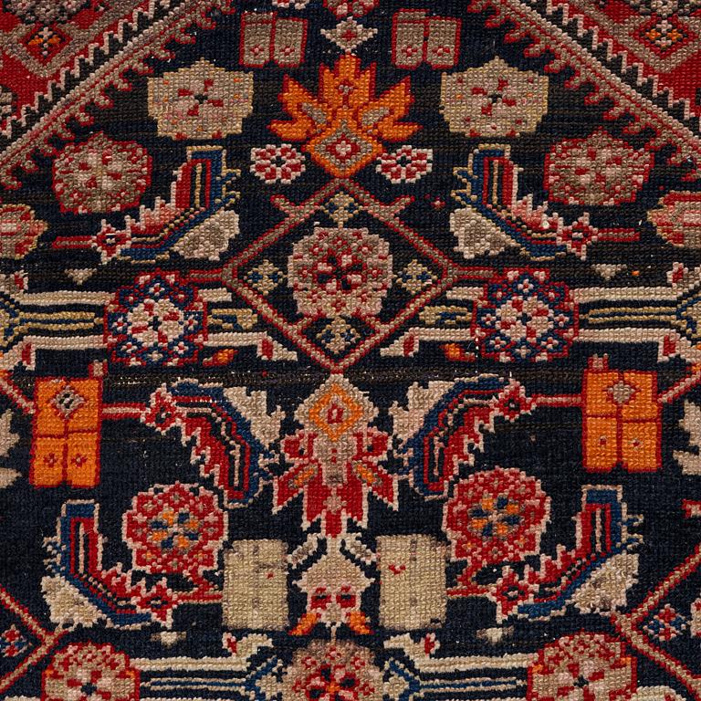 An oriental rug, approx. 148 x 110 cm.