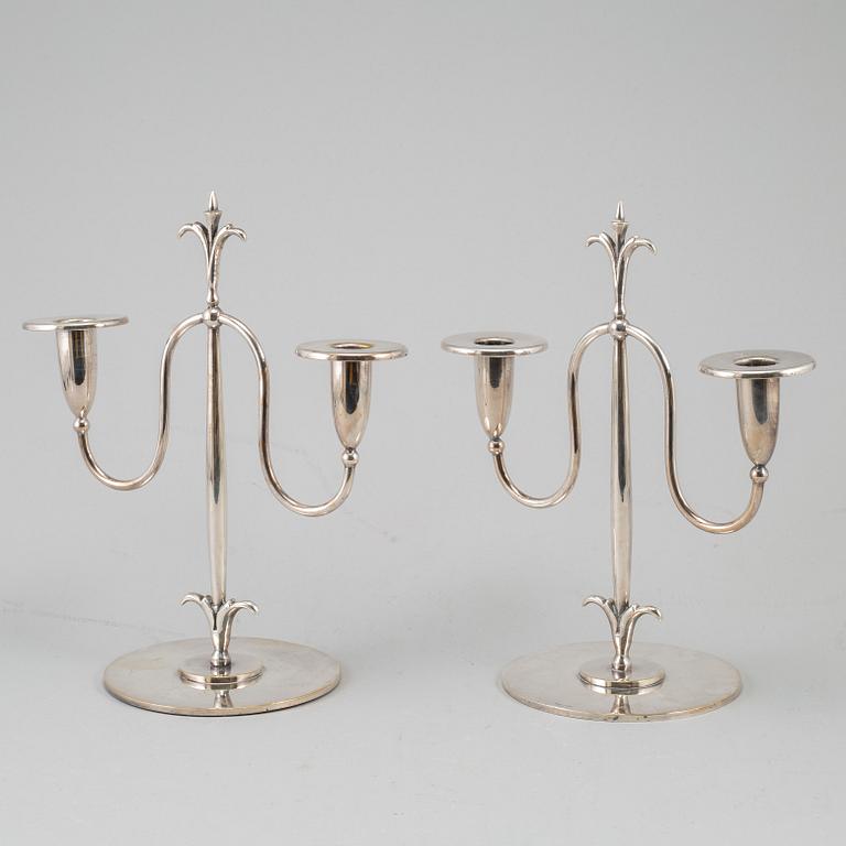 a pair of Elis Bergh silver plated candelabras, Swedish grace, CG Hallberg, Stockholm, 1920s.