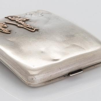 Two silver cigarette cases, J. H. Werner, Berlin, 1922, and Huguenin Frères, Switzerland before 1933.