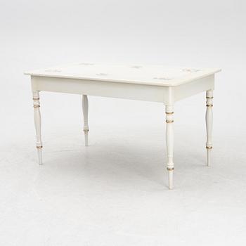 A dining table, mid-19th Century.