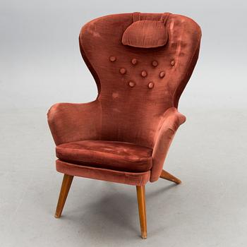 A mid-20th century 'Siesta' armchair for Puunveisto Oy - Träsnideri Ab, Finland.