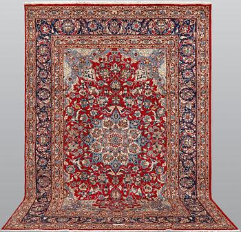 A signed Kashan carpet, ca 313 x 195 cm.