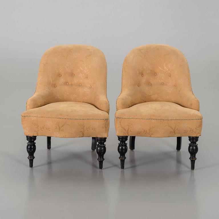 a pair of late 19th century easy chairs.