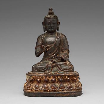 A bronze figure of Buddha, Ming dynasty (1368-1644).