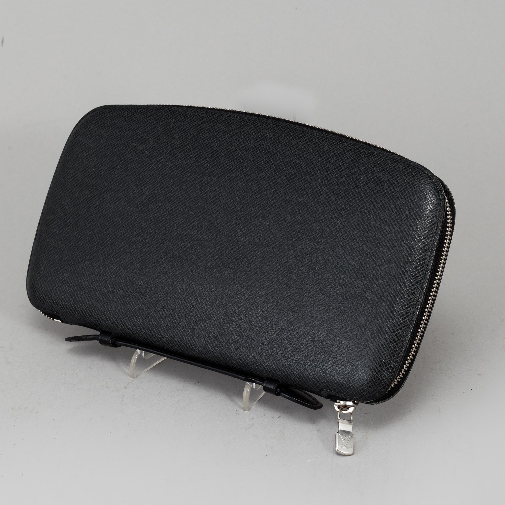 LOUIS VUITTON, an 'Atoll Ardiose' Taiga leather trave organizer, 2015.
