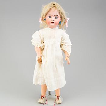 a porcelain doll from the 1920's.