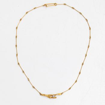 Björn Weckström, Halsband "Diamantknopp", 18K guld,  åttkantsslipad diamant ca 0.02 ct. Lapponia 1979.