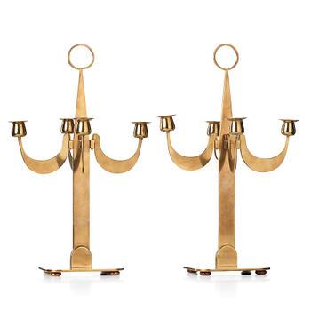 Josef Frank, a pair of brass candelabra by Svenskt Tenn, 1950's, model nr 2663.