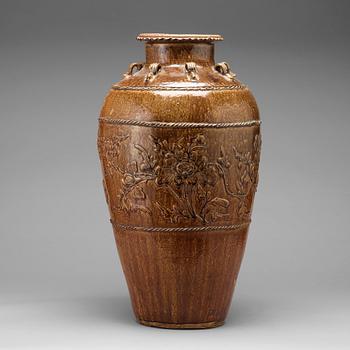 668. A large brown glazed Martaban jar, presumably 18th Century.