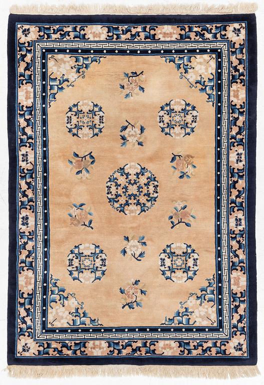 A semi-antique chinese rug, c. 195 x 132 cm .