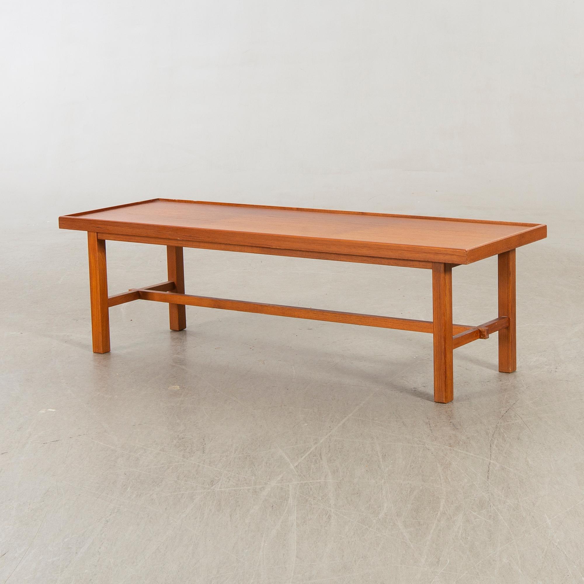 A 1960/70s teak bench.