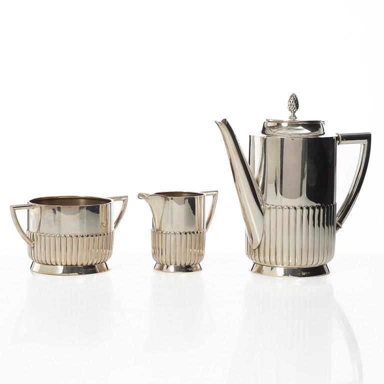 Guldsmedsaktiebolaget (GAB), A Swedish silver coffee pot, cream jug and sugar bowl, mark of GAB, Stockholm 1918-1919.