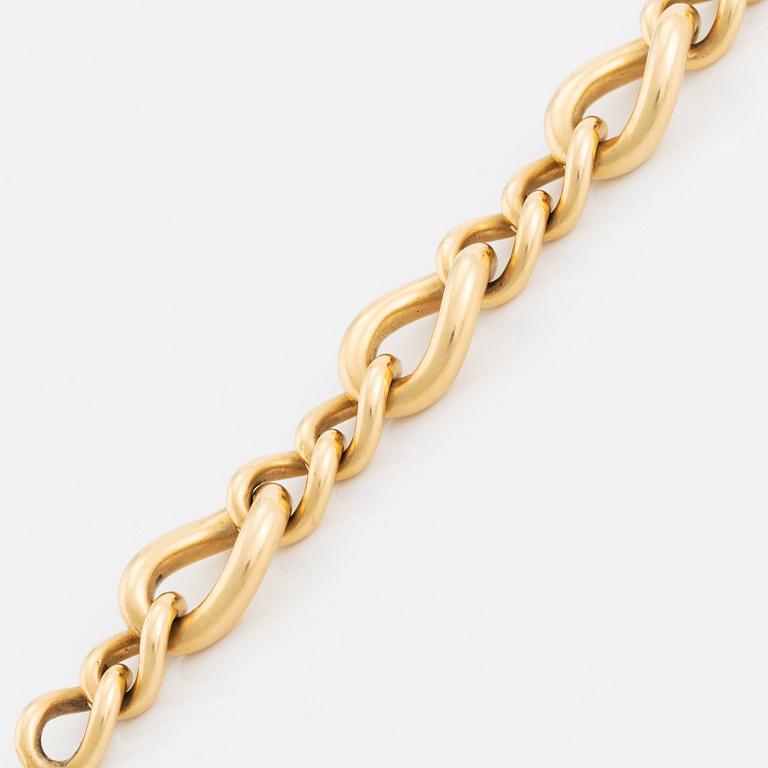 An 18K gold Tännler bracelet.