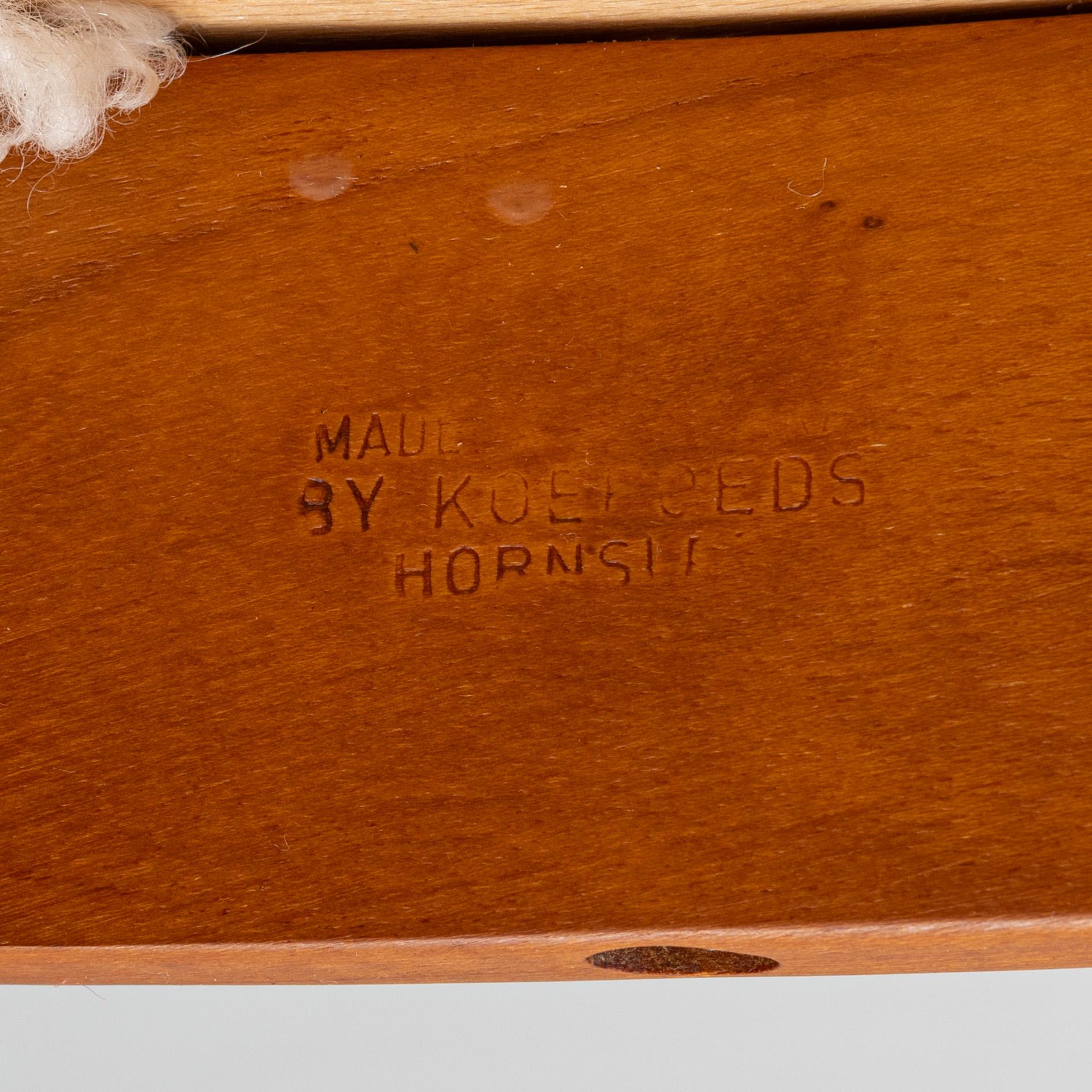 Niels Koefoed, six teak dining chairs upholstered in sheepskin, Denmark, 1960's.